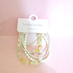 Elegant Gold and White Beaded Bracelet Set